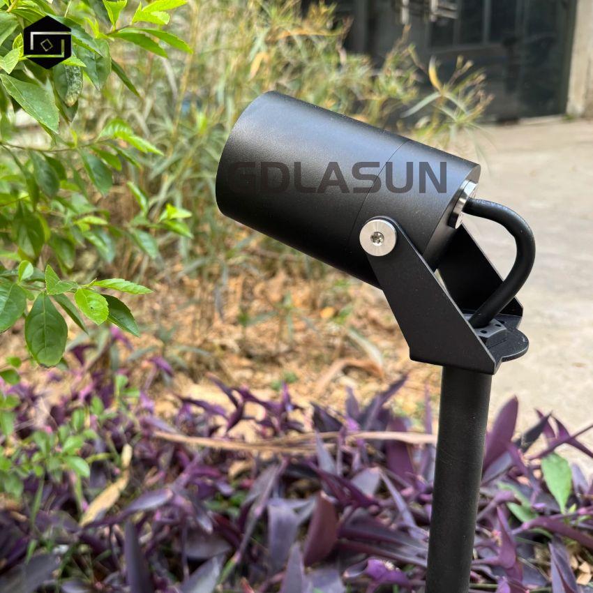 Outdoor spotlights spike in the garden grass